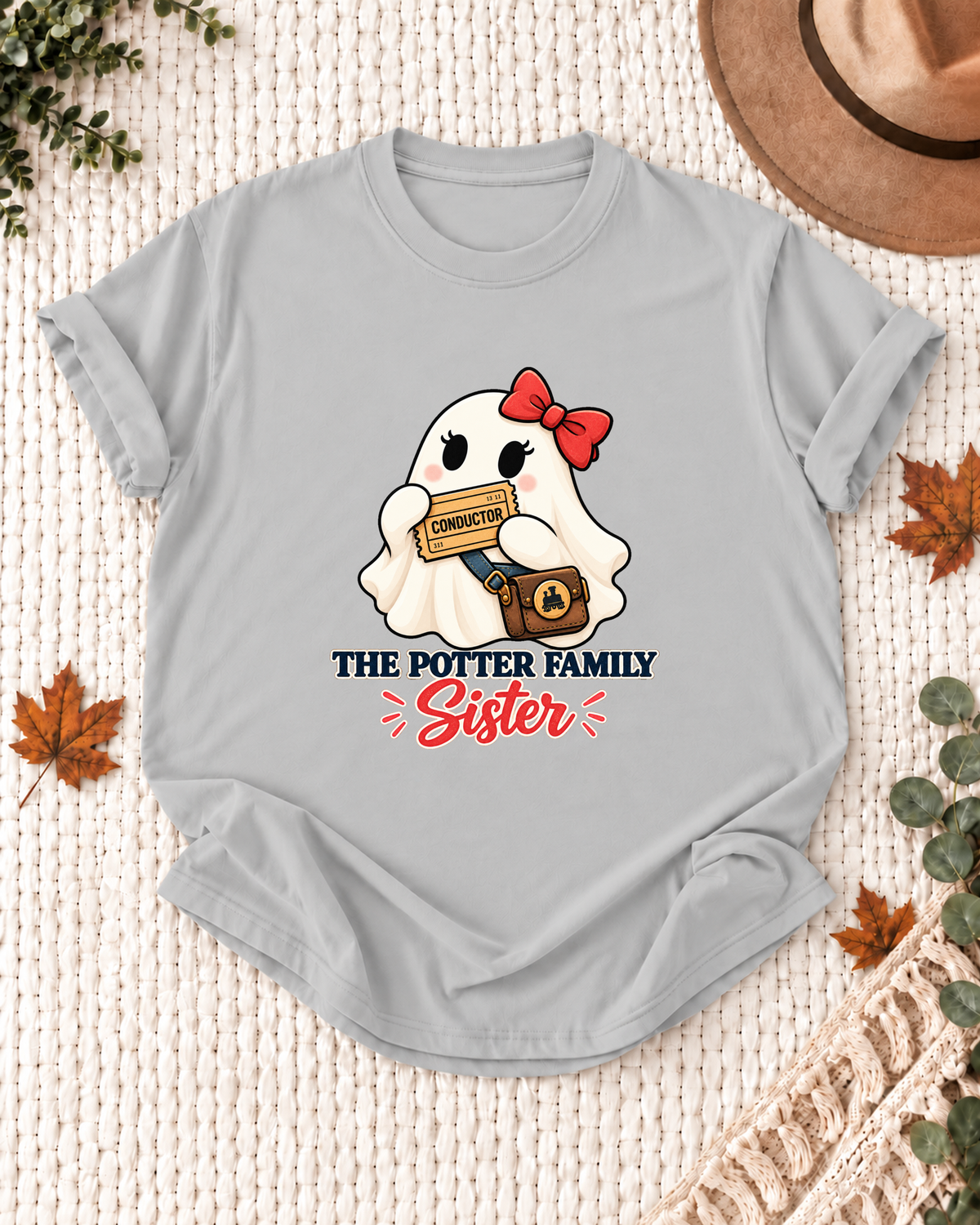 Sister's Ash Grey personalized Halloween shirt mockup with a train conductor ghost with keys and rail accents, sample family lettering, and the role label.