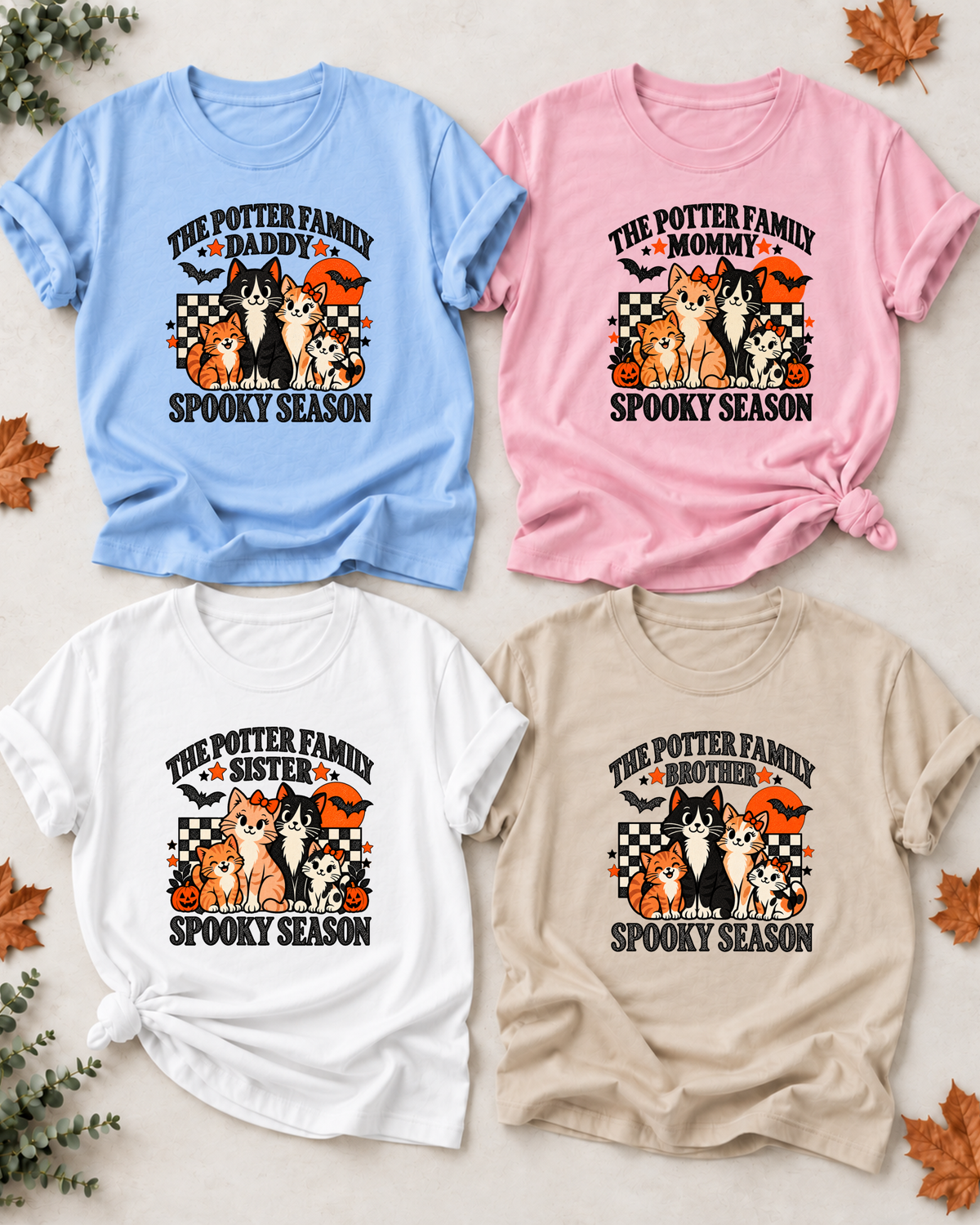 Four Halloween family T-shirts with illustrated cats: Daddy in light blue, Mommy in light pink, Sister in white, and Brother in sand, each showing example family-name text and Spooky Season lettering.