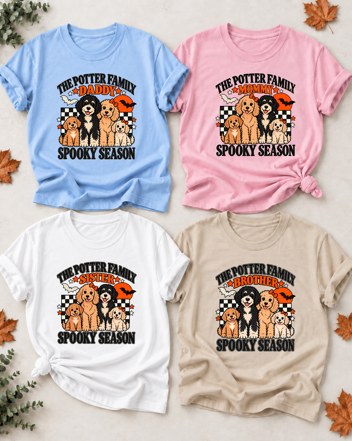 Four Halloween family T-shirts with illustrated dogs: Daddy in light blue, Mommy in light pink, Sister in white, and Brother in sand, each showing example family-name text and Spooky Season lettering.