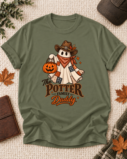 Olive Daddy T-shirt with a patchwork ghost wearing a cowboy hat and scarf, holding a jack-o'-lantern, with example family-name text.