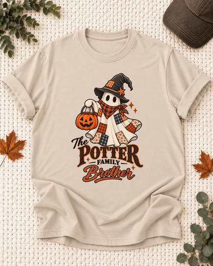 Sand Brother T-shirt with a patchwork ghost wearing a witch hat and scarf, holding a jack-o'-lantern, with example family-name text.