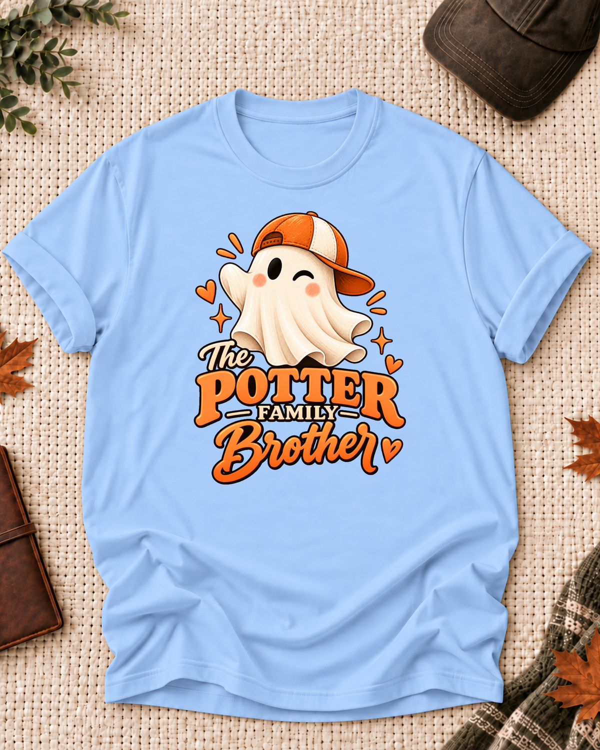 Brother's Light Blue personalized Halloween shirt mockup with a playful ghost in an orange baseball cap, sample family lettering, and the role label.