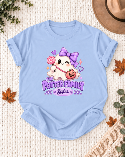 Sister's Light Blue personalized Halloween shirt mockup with a ghost with a purple bow, lollipop, and pumpkin bag, sample family lettering, and the role label.