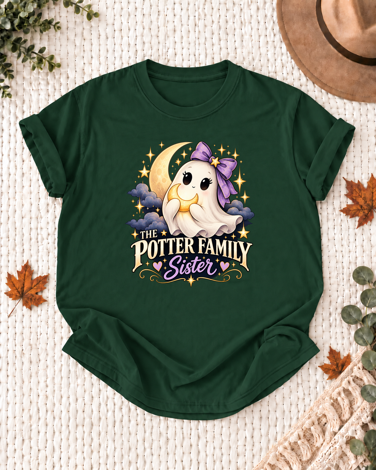 Sister's Dark Green personalized Halloween shirt mockup with a ghost with a purple bow, crescent moon, and stars, sample family lettering, and the role label.