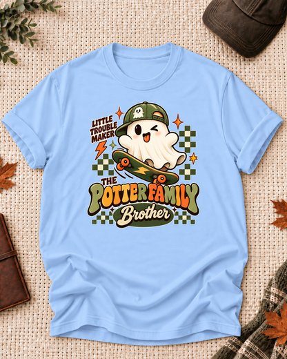 Brother's Light Blue personalized Halloween shirt mockup with a ghost in a green cap with a skateboard and checkerboard accents, sample family lettering, and the role label.
