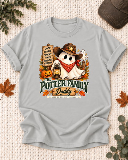 Daddy's Ash Grey personalized Halloween shirt mockup with a cowboy-hat ghost with a lantern, bandana, and pumpkin, sample family lettering, and the role label.