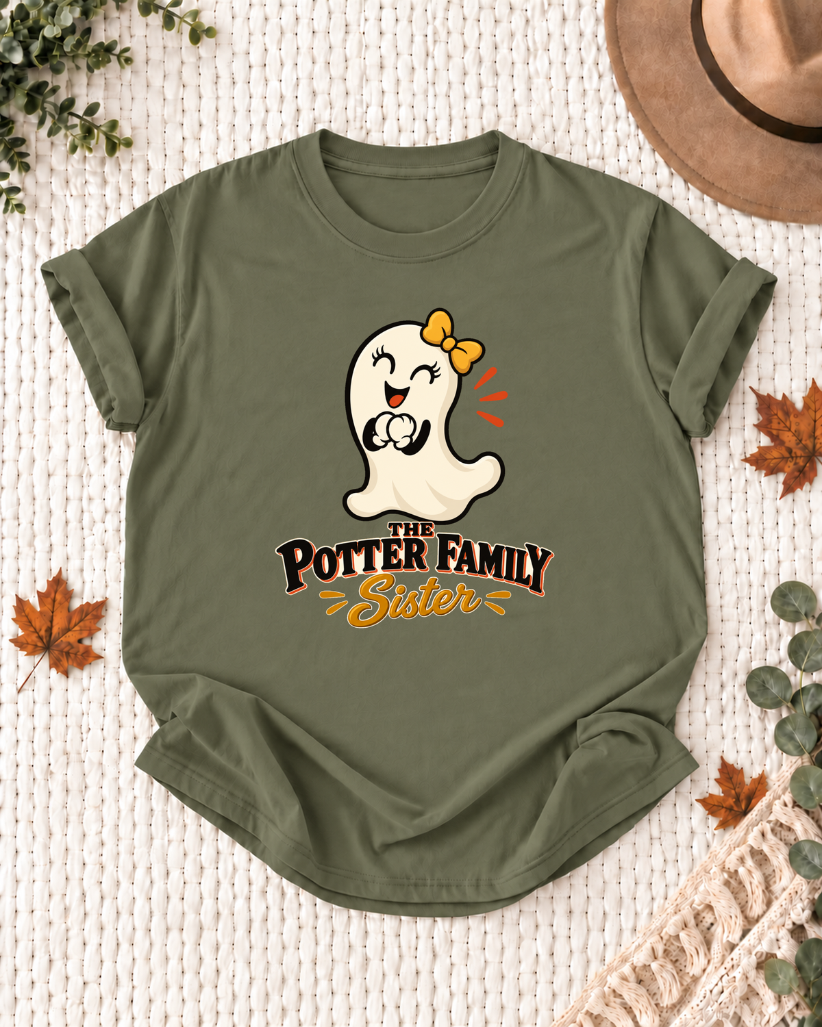 Sister's Olive personalized Halloween shirt mockup with a cartoon ghost with a yellow bow, sample family lettering, and the role label.