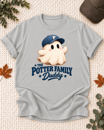 Daddy's Ash Grey personalized Halloween shirt mockup with a rounded ghost with a navy cap and blue lettering, sample family lettering, and the role label.