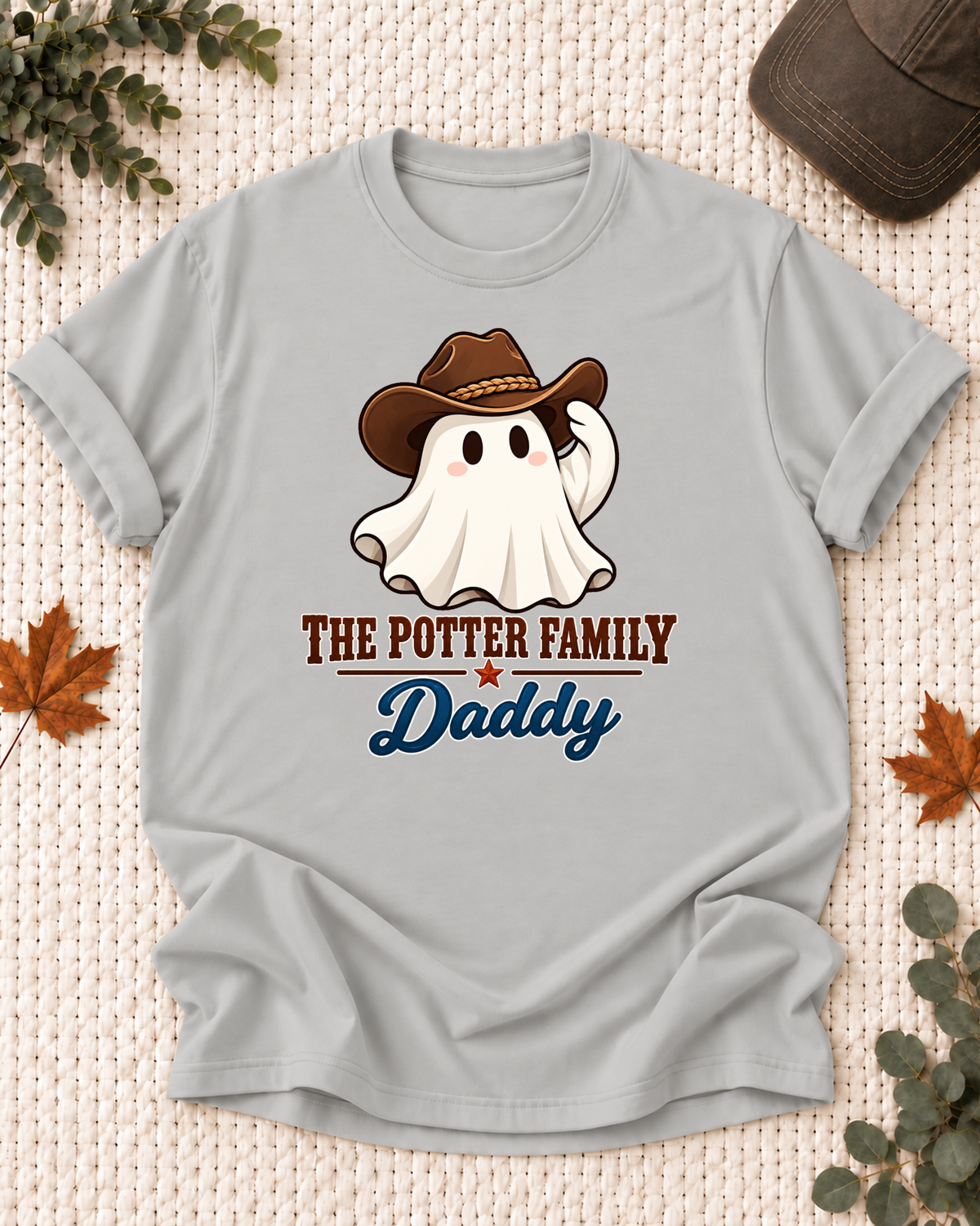 Daddy's Ash Grey personalized Halloween shirt mockup with a western ghost in a cowboy hat with country accessories, sample family lettering, and the role label.