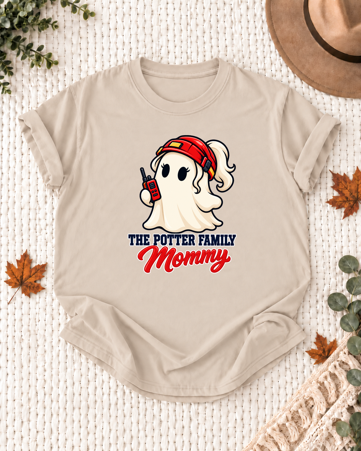 Mommy's Sand personalized Halloween shirt mockup with a firefighter ghost in a red helmet with rescue details, sample family lettering, and the role label.