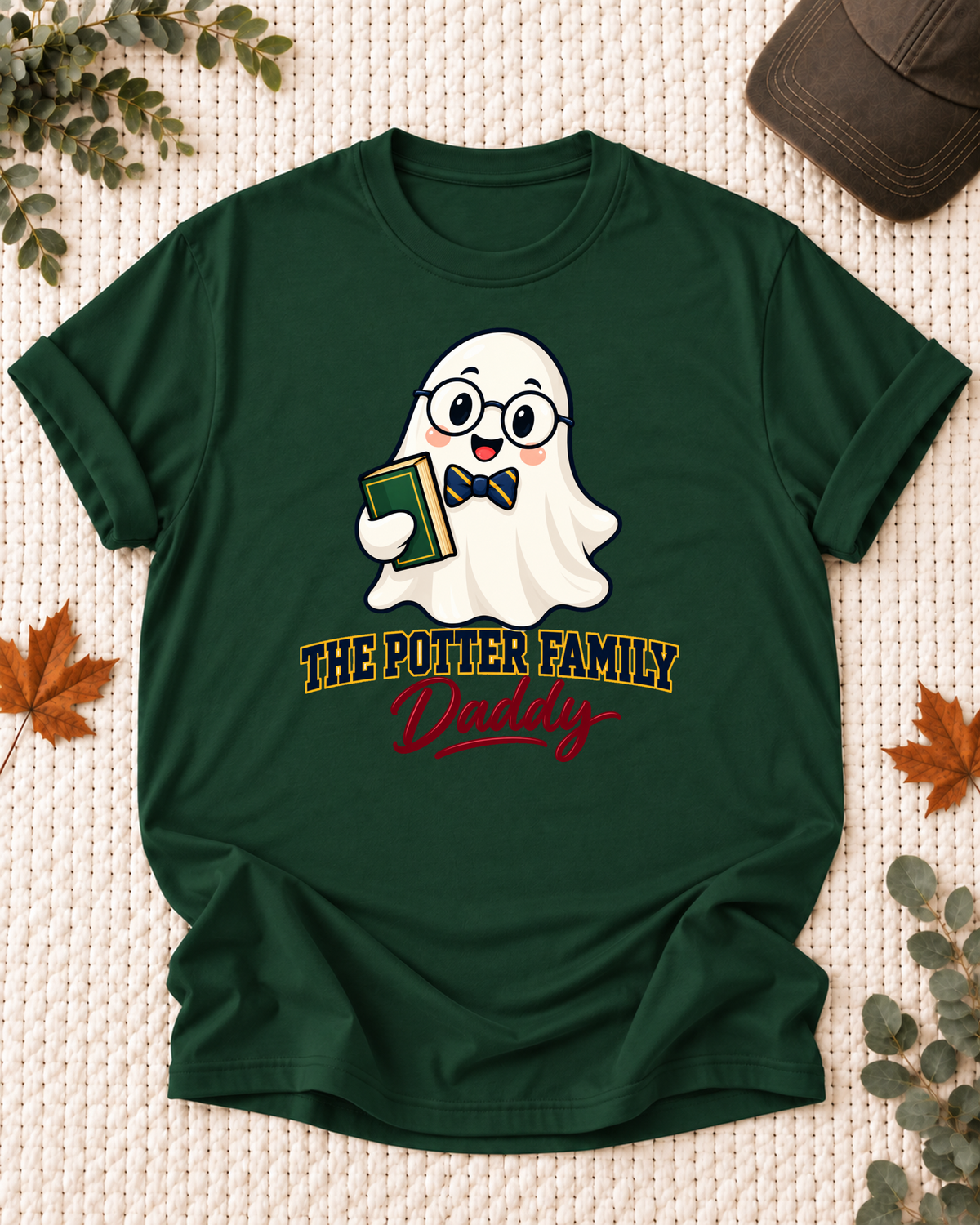 Daddy's Dark Green personalized Halloween shirt mockup with a schoolhouse ghost with glasses, bow tie, and school supplies, sample family lettering, and the role label.
