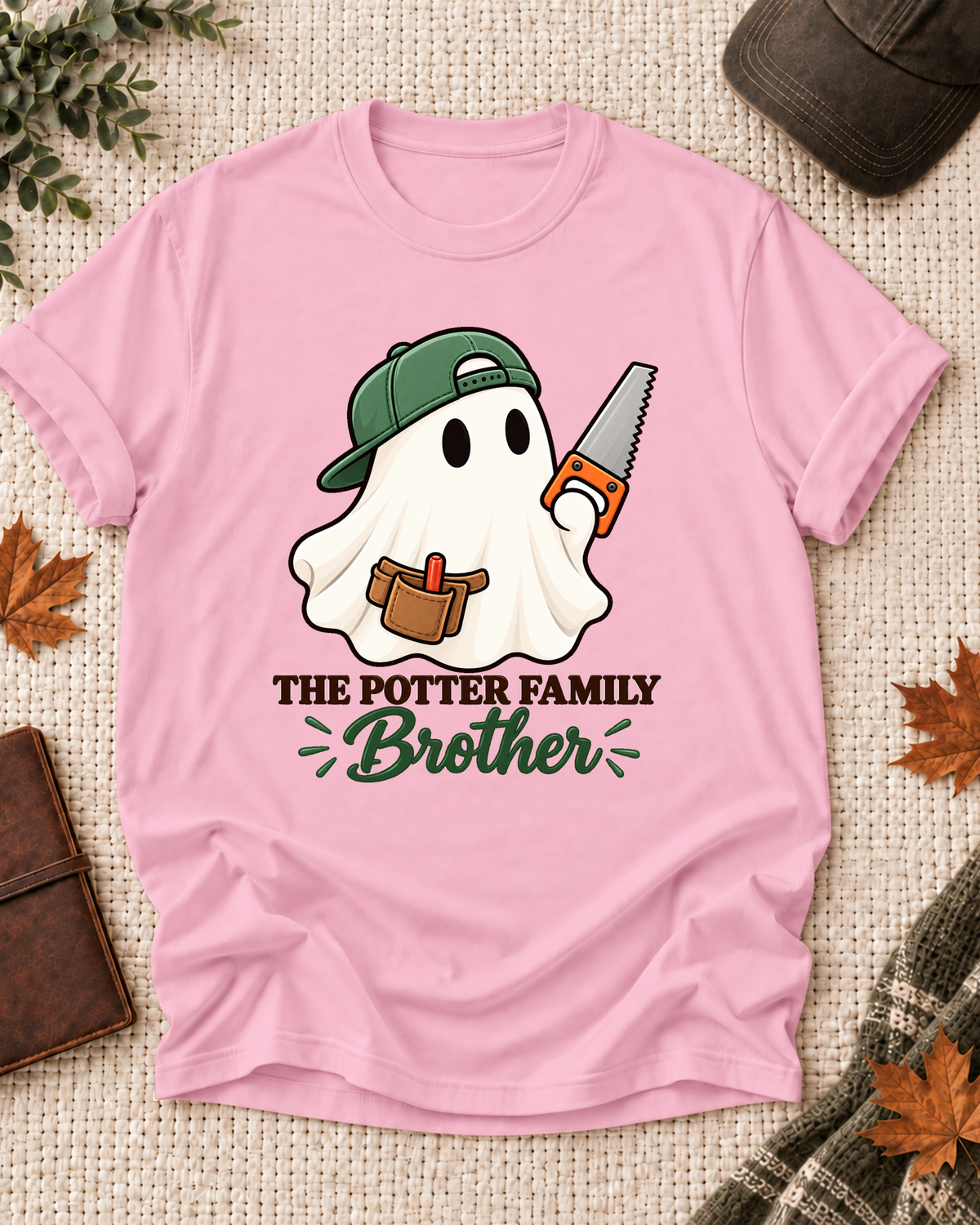 Brother's Light Pink personalized Halloween shirt mockup with a carpenter ghost with work tools and woodshop accents, sample family lettering, and the role label.