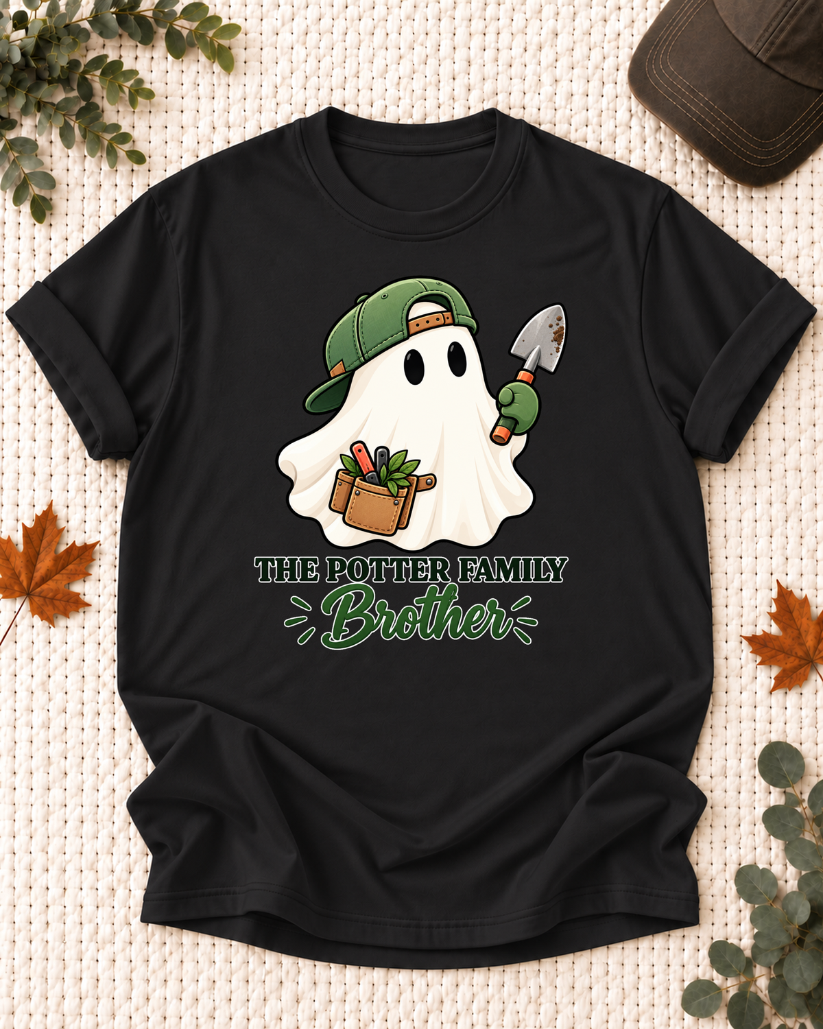 Brother's Black personalized Halloween shirt mockup with a garden ghost with a trowel and potted plant accents, sample family lettering, and the role label.