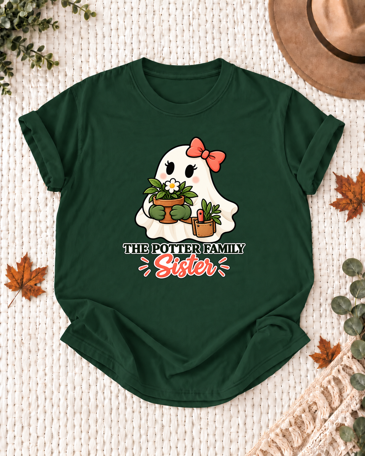 Sister's Dark Green personalized Halloween shirt mockup with a garden ghost with flowers and plant details, sample family lettering, and the role label.