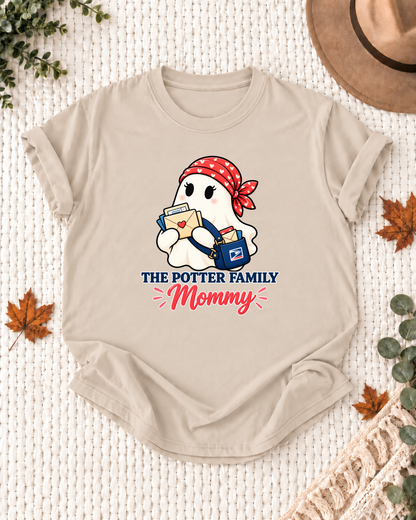 Mommy's Sand personalized Halloween shirt mockup with a mail carrier ghost with a postal hat and letters, sample family lettering, and the role label.