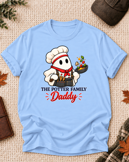 Daddy's Light Blue personalized Halloween shirt mockup with a chef ghost with a sauté pan, sample family lettering, and the role label.