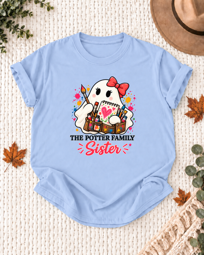 Sister's Light Blue personalized Halloween shirt mockup with an artist ghost with paint splatter and art details, sample family lettering, and the role label.