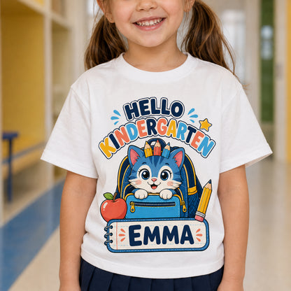 Close-up of colorful cat school artwork with the example name Emma and grade text.